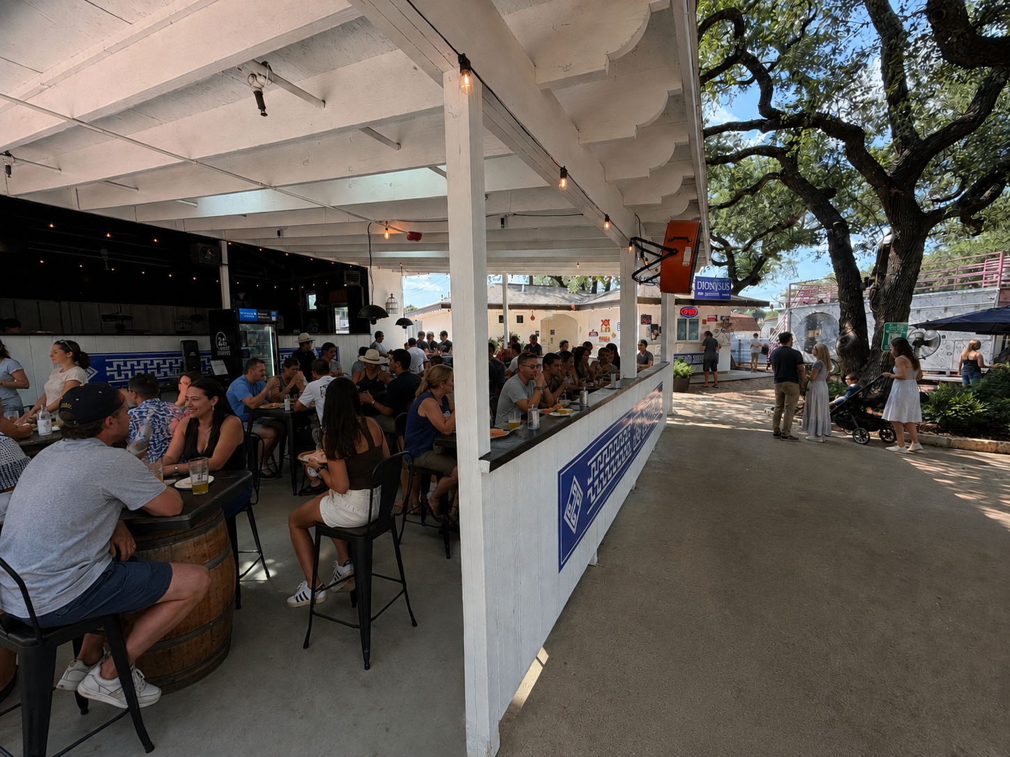 Covered patio seating at Dionysus Beer & Wine